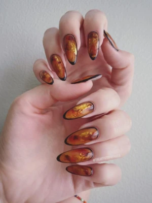 Sheer Amber Skittle Nails